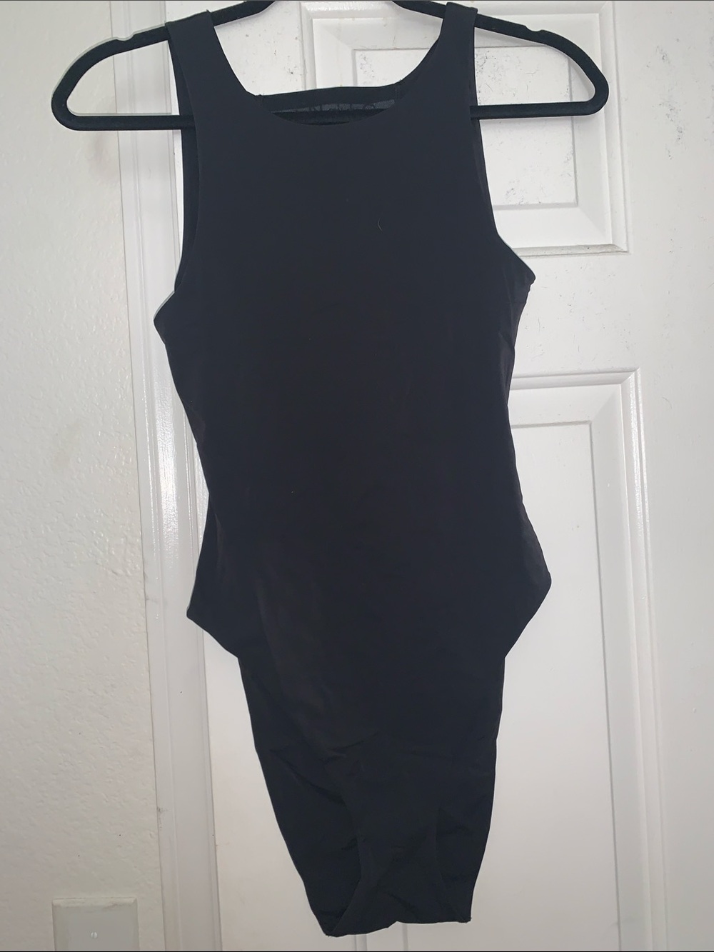 Black Calvin Klein Bodysuit — size S